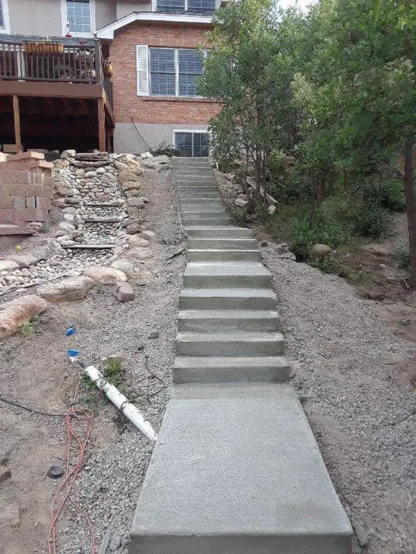 Long concrete stair walkway on a sloped lot in Colorado Springs