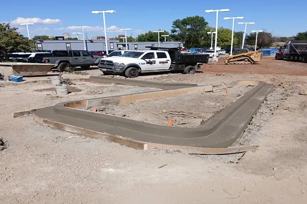 Curved concrete curb forms on a large commercial site in Colorado Springs
