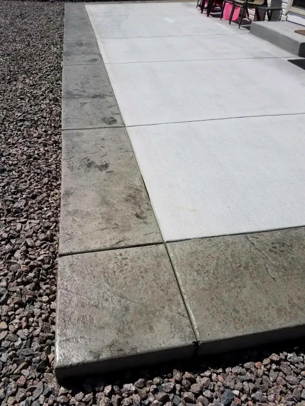 Concrete patio with a stamped border and smooth center in Colorado Springs
