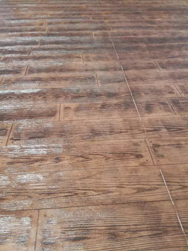 Close-up of wood-plank stamped concrete texture in Colorado Springs