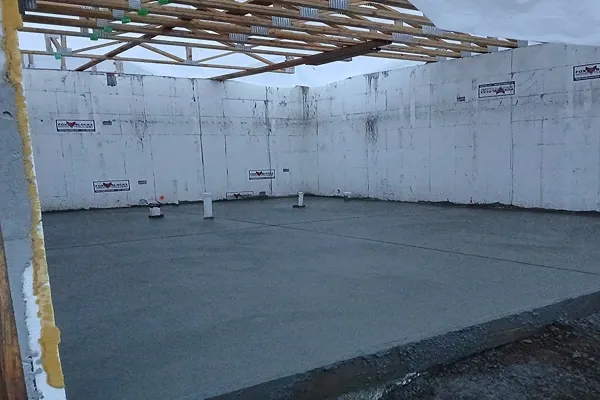 Concrete slab poured inside insulated concrete form foundation walls in Colorado Springs